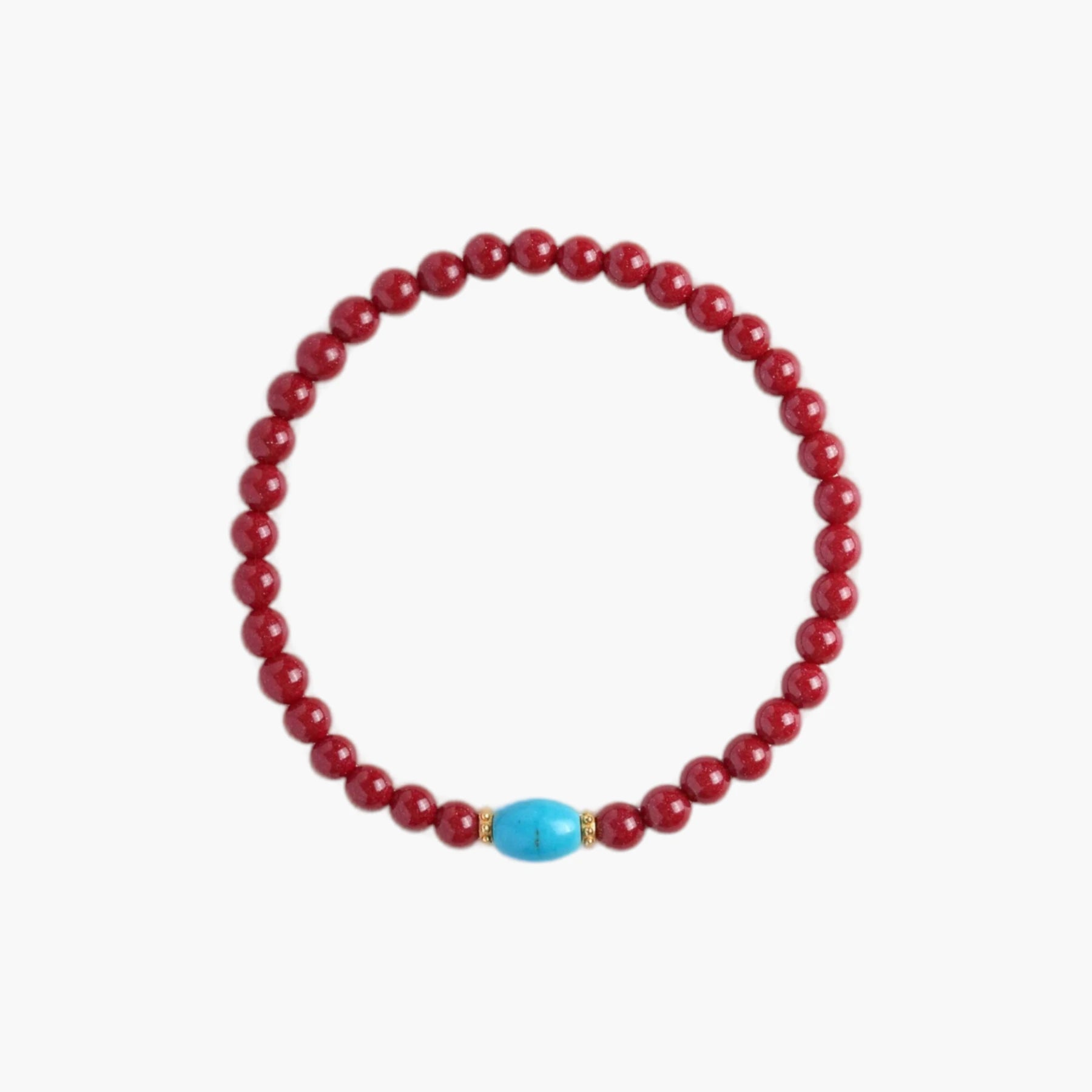 Handmade cinnabar and turquoise bracelet, front view with gold accents