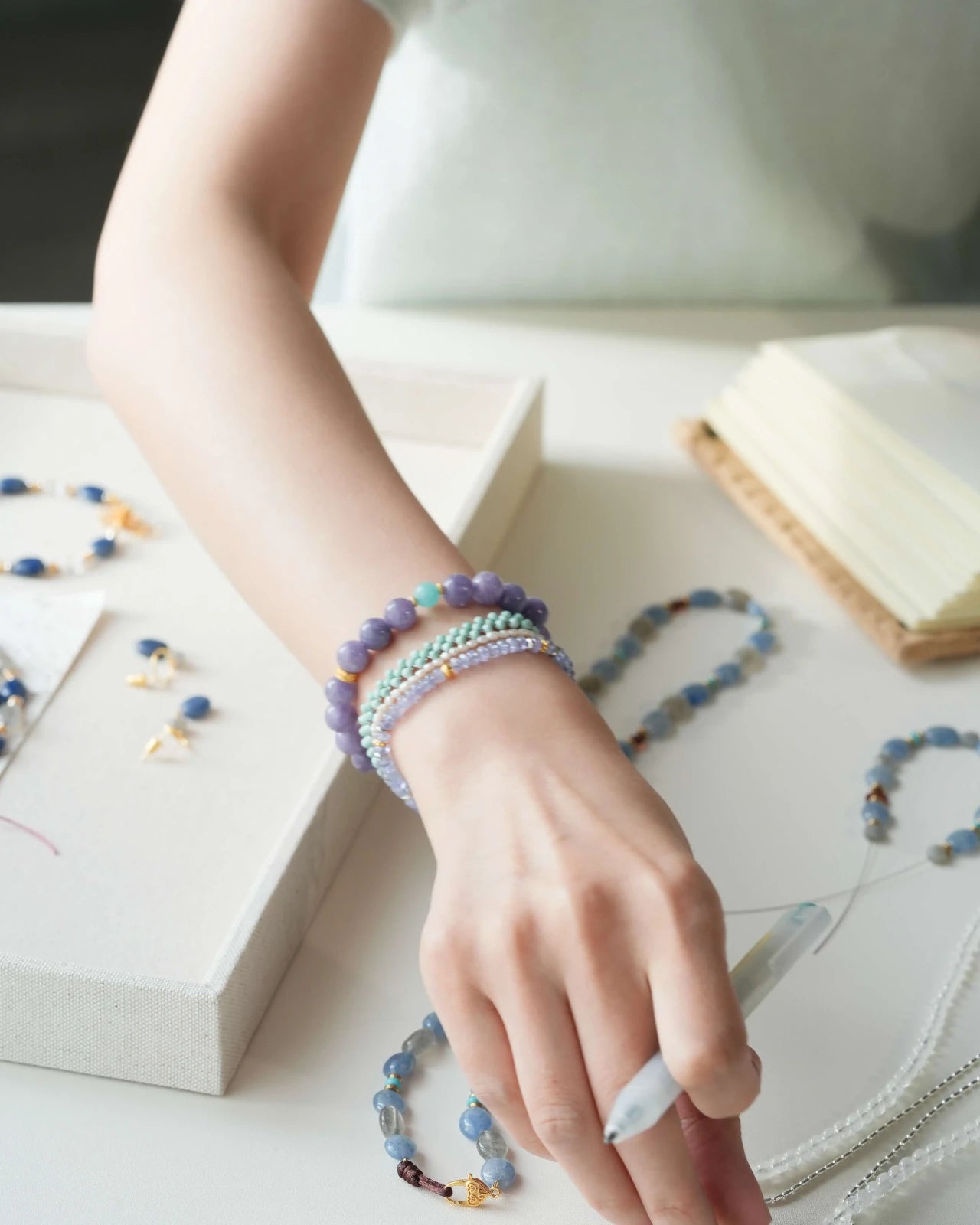 Lifestyle photo of Lavender Tide Serenity Bracelet with chalcedony and amazonite beads