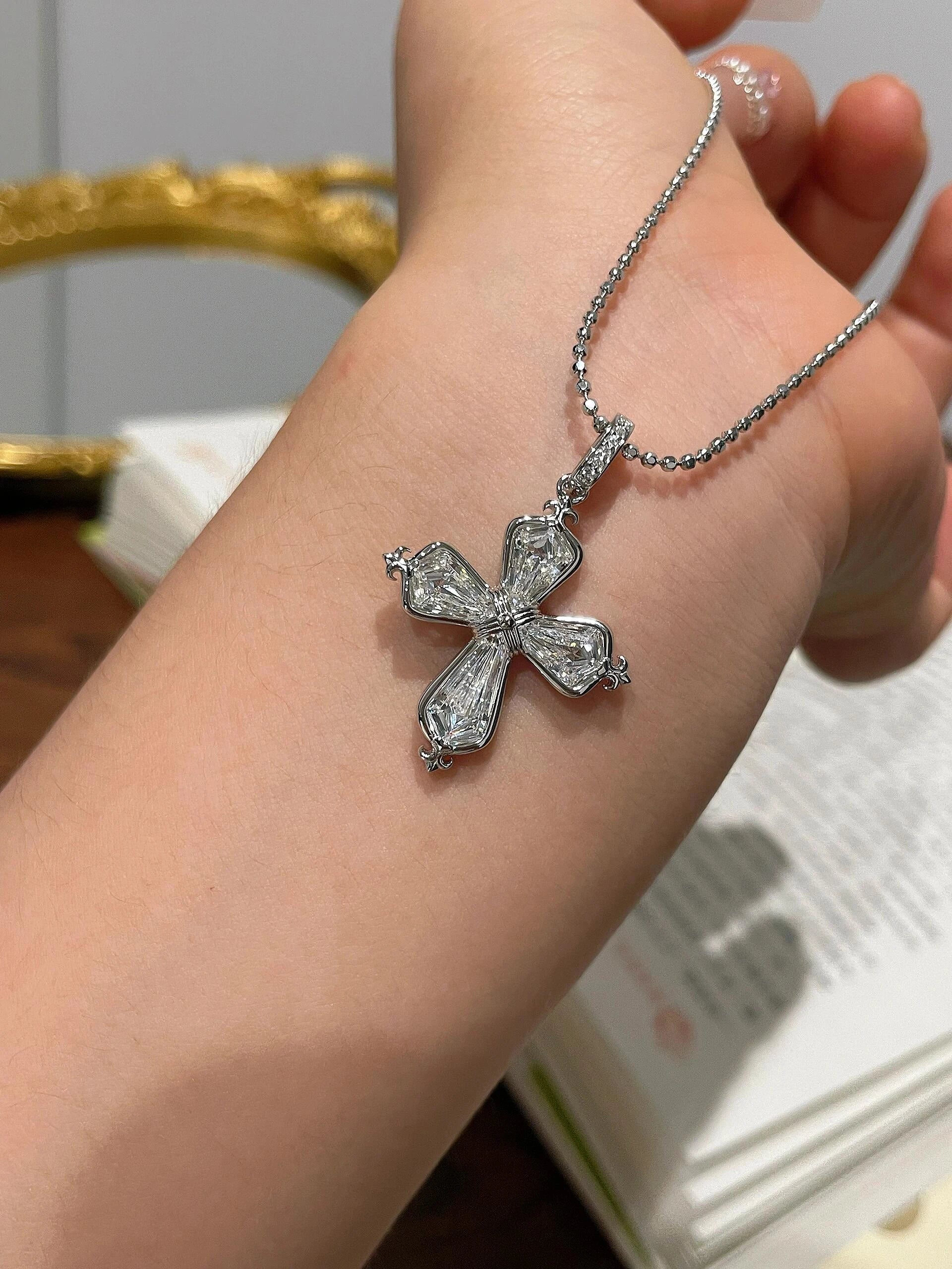 Silver Iris Cross Pendant Necklace