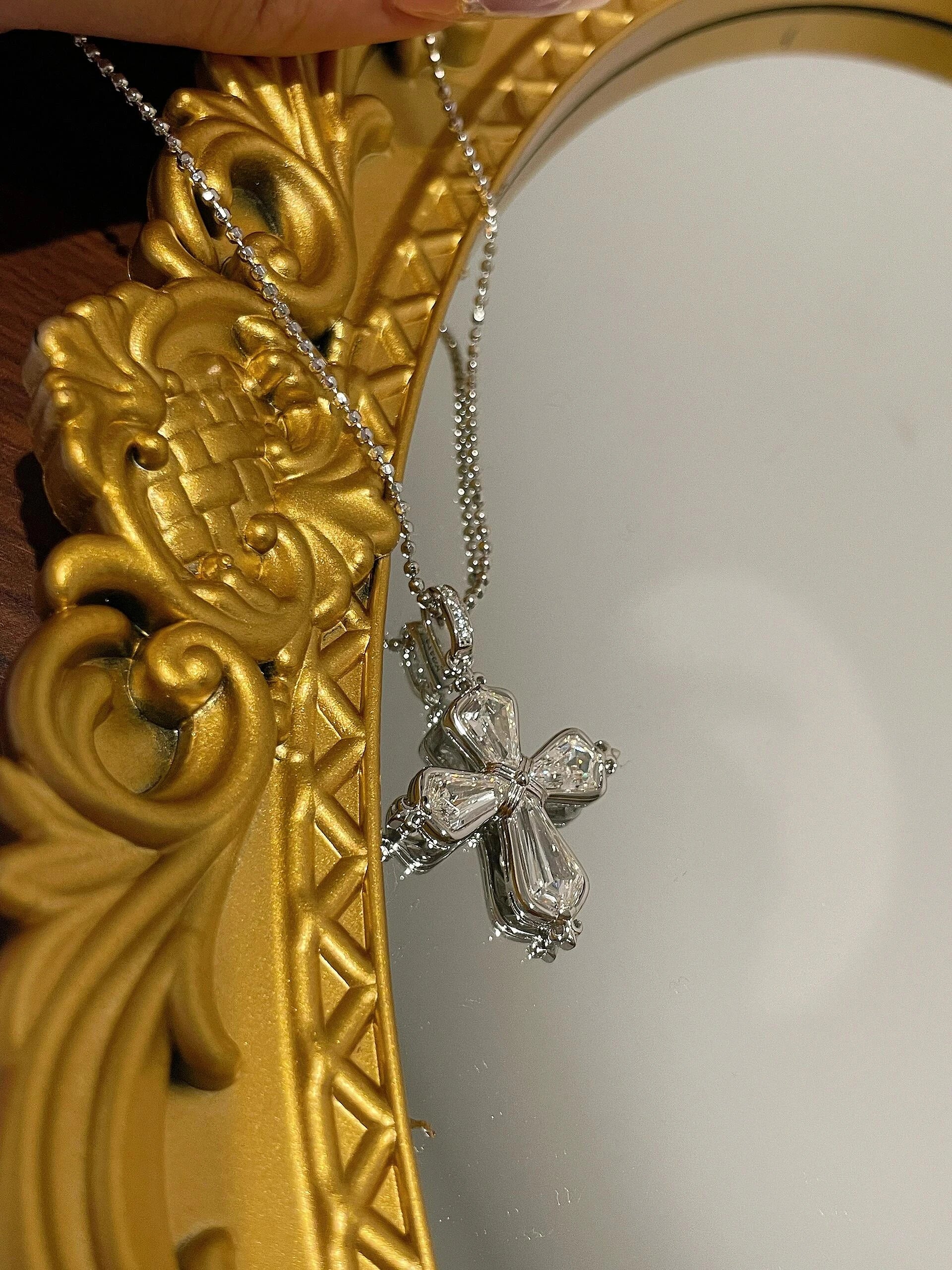 Silver Iris Cross Pendant Necklace